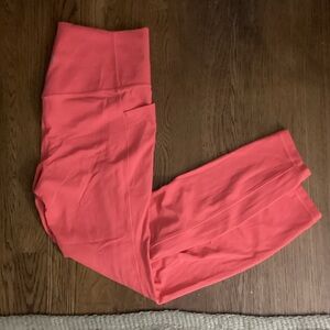 Athleta salutation stash 7/8 leggings - size medium